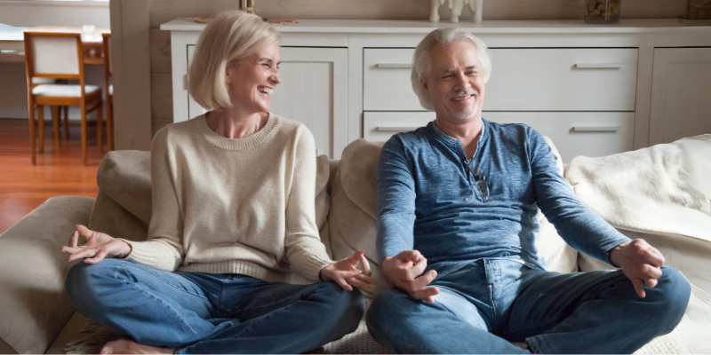 Relaxed couple practising mindfulness