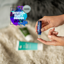 YES O YES clitoral stimulant being applied with the rollerball to the finger